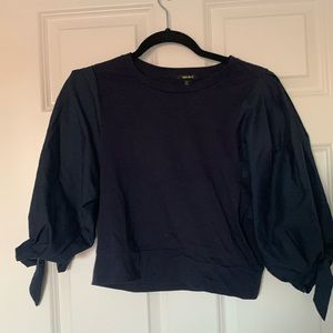 Navy blue too with puffy sleeves. Size Medium.